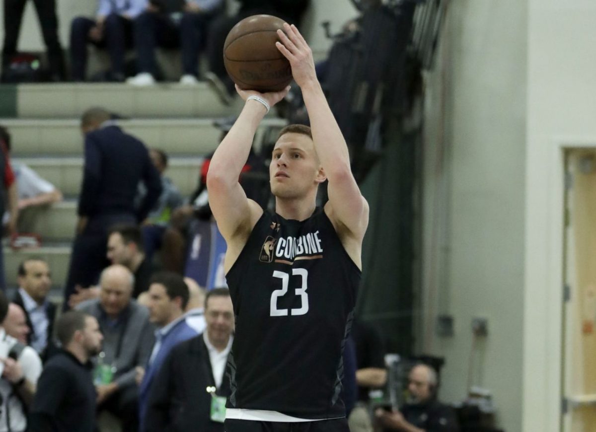 Villanova's Donte DiVincenzo to remain in NBA Draft, sign with agent