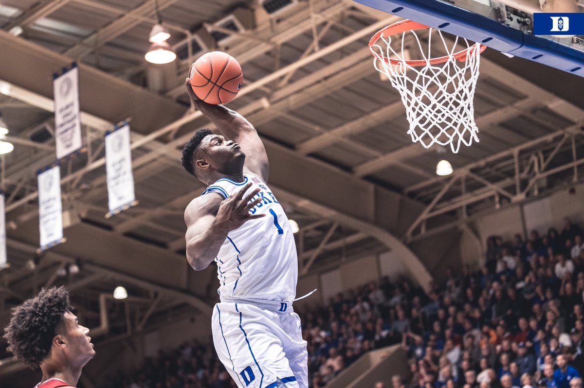Zion Williamson is seemingly floating in this incredible photo of R.J.  Barrett's reverse dunk - Article - Bardown